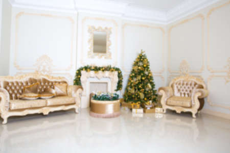 Luxury living room interior decorated with chic Christmas tree.の写真素材