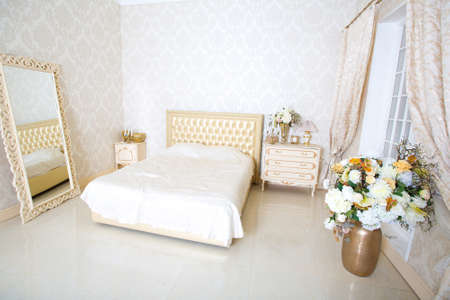Luxury elegant white with gold interior design of bedroomの写真素材