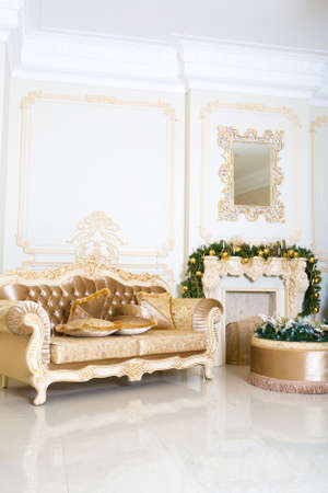 Luxury living room interior decorated with chic Christmas tree.の写真素材
