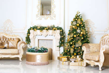 Luxury living room interior decorated with chic Christmas tree.の写真素材