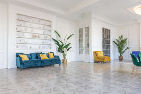 modern and very stylish interior design of large studio apartment with fashionable furniture with...