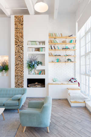 Fashionable spacious apartment with a stylish design in green, gray and white pastel colors with big...