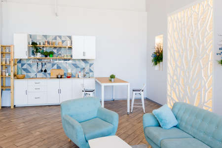 Fashionable spacious apartment with a stylish design in green, gray and white pastel colors with big...