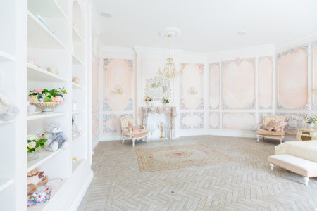 Luxurious expensive interior design of the bed room in the old Baroque style in beige colors