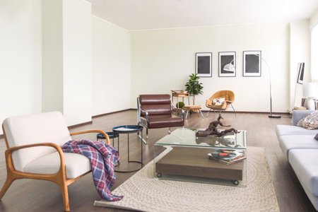 interior of stylish loft. spacious apartment with large windows, parquet on the floor and light...