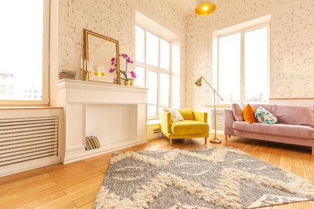 Scandinavian style apartment interior. bright yellow warm colors. wooden flooring. sunlight in large...