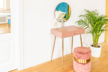 Scandinavian style apartment interior. bright yellow warm colors. wooden flooring. sunlight in large windows.の写真素材