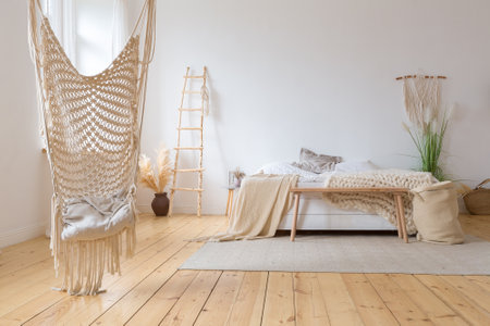 cute cozy light interior design of the apartment with a free layout of the kitchen and bedroom...