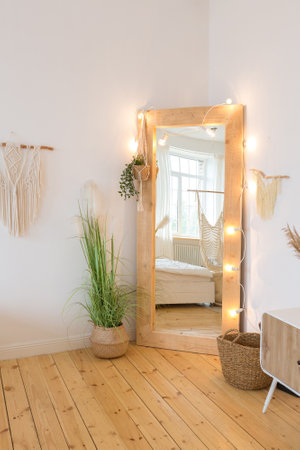 cute cozy light interior design of the apartment with a free layout of the kitchen and bedroom...