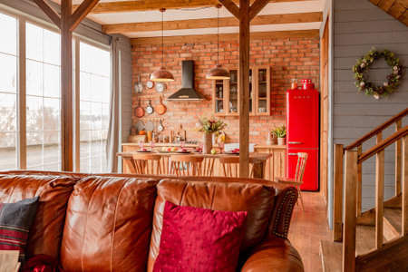cozy all wooden interior of a country house in a wooden design. spacious living room with kitchen...