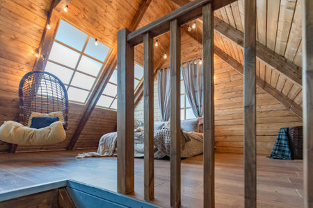 cozy all wooden interior of a country house in a wooden design. spacious living room with kitchen...