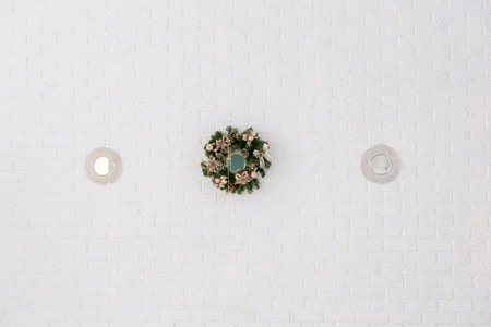 Luxurious and expensive interior of an open-plan apartment in light colors. Stylish modern bedroom with minimal design, dining area and guest space.の写真素材