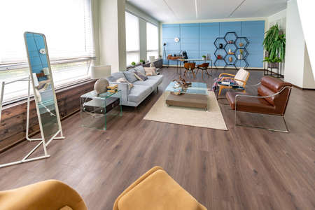 Modern trendy creative design of a personal studio office with a seating area in the style of...
