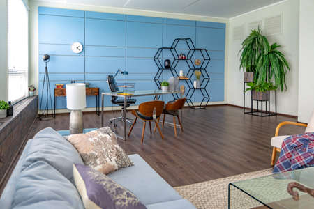 Modern trendy creative design of a personal studio office with a seating area in the style of...