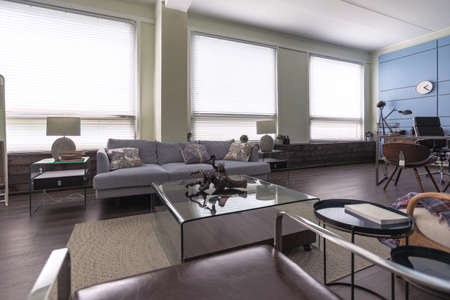 Modern trendy creative design of a personal studio office with a seating area in the style of...