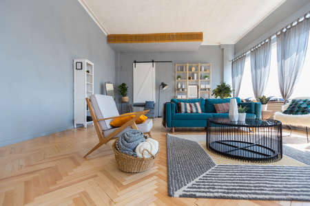 elegant creative modern trendy interior of a spacious open plan Scandinavian style studio with...