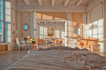 rich apartment interior with golden baroque decorations on the walls and luxury furniture. the room...