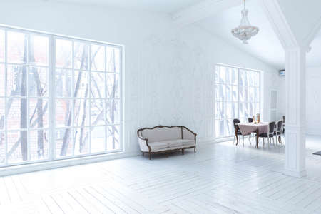 Spacious bright living room with a stylish modern design with elements of antique decor and...