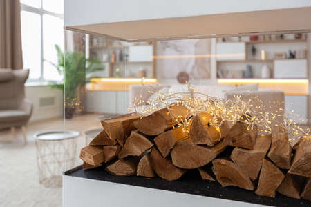 interior design spacious bright studio apartment in Scandinavian style and warm pastel white and beige colors. trendy furniture in the living area and modern details in the kitchen area.の写真素材