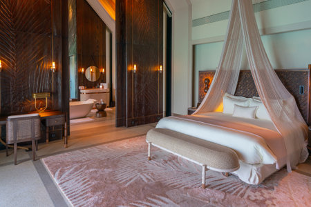Luxurious interior of a very expensive rich water villa in the Maldives, decorated with natural wood.の写真素材
