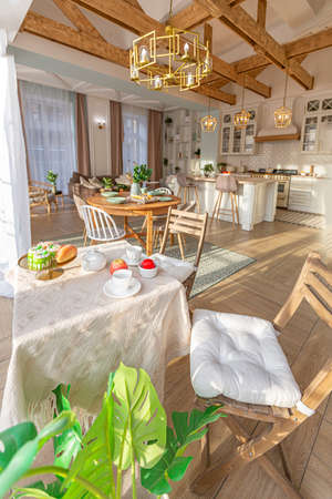 modern expensive luxurious open-plan apartment. Rich Scandinavian-style interior with wooden beams...