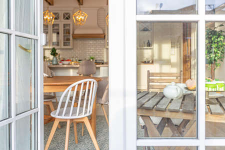 modern expensive luxurious open-plan apartment. Rich Scandinavian-style interior with wooden beams...