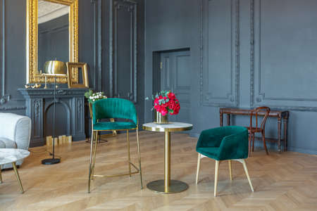 chic interior of the room in the Renaissance style of the 19th century with modern luxury furniture....