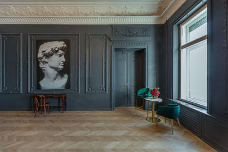 chic interior of the room in the Renaissance style of the 19th century with modern luxury furniture....