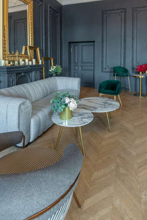 chic interior of the room in the Renaissance style of the 19th century with modern luxury furniture....