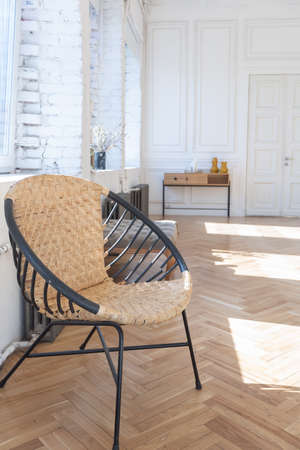 expensive modern light luxury interior design of a spacious living room with wooden elements and white walls. filled with original and unusual decorative thingsの写真素材