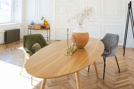 expensive modern light luxury interior design of a spacious living room with wooden elements and...