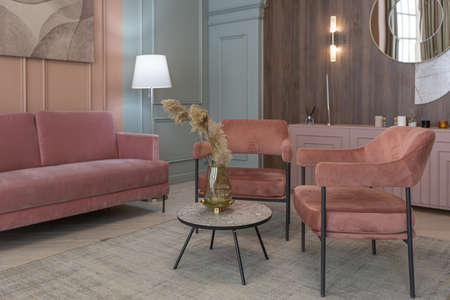 chic modern trendy apartment interior design. trendy green and powdery pink walls. stylish lighting and huge panoramic windowsの写真素材