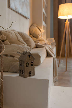 cozy warm home interior of a chic country house with an open plan, wood finishes, warm colors and a family hearthの写真素材