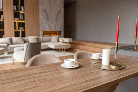 chic modern design of a dark expensive interior of a luxurious cozy apartmentの写真素材