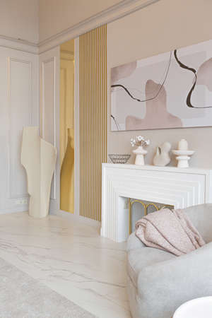 the latest fashion home trends in an ultra modern elegant interior of a cozy studio in soft pastel...