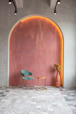 interior of a large apartment in oriental mixed with loft style with arches, led lighting and bright orange elementsの写真素材