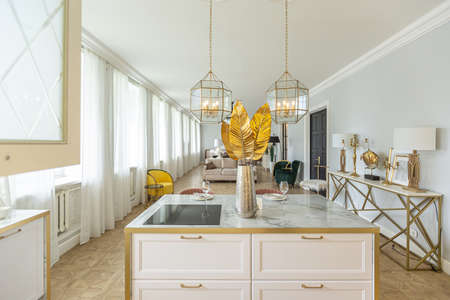 luxury interior of a modern apartment in bright colors with stylish furniture. kitchen, bedroom and...