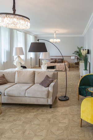 luxury interior of a modern apartment in bright colors with stylish furniture. kitchen, bedroom and...