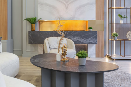 stylish luxury interior of modern studio apartment in green pastel colors with wooden elements....