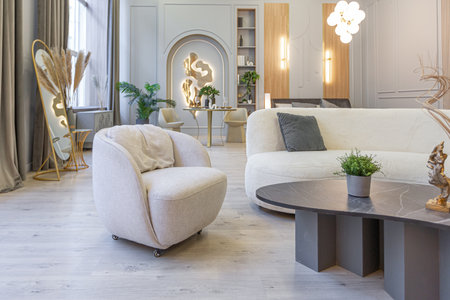 stylish luxury interior of modern studio apartment in green pastel colors with wooden elements. expensive furniture and decorationsの写真素材