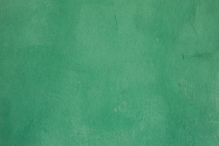Green grunge wall texture background for any design with copy space.の写真素材