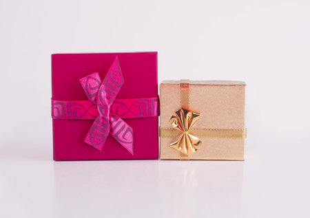gift box with ribbon bow on white background, holiday and celebration conceptの写真素材