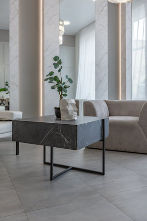 stylish bright modern bedroom interior with decorative niches with LED lighting and a huge panoramic...