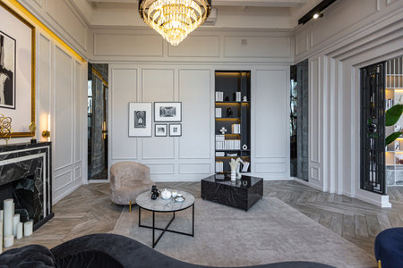 stylish cozy light bright luxurious spacious interior of a country house white walls with ornaments,...