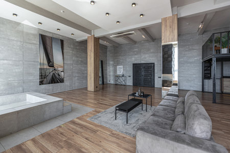 stylish minimalistic restrained modern interior of a two-storey apartment without people in the...