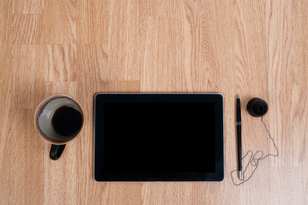 Office work desk with a cup of coffee. Inserting text.の写真素材