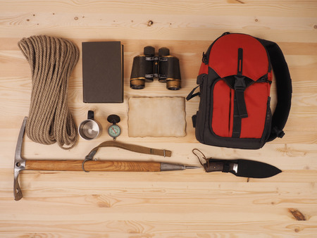 Concept. scene expedition in retro style on wood backgroundの写真素材
