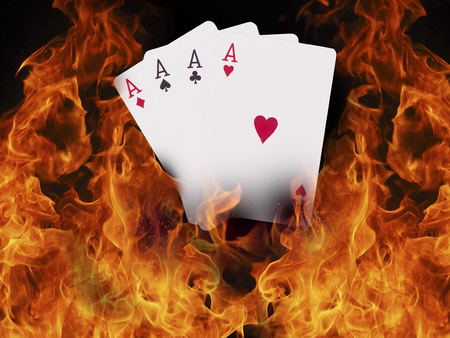 4 Playing cards on fire. casino conceptの写真素材