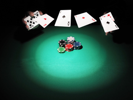 Man playing poker on green background. Casino concept