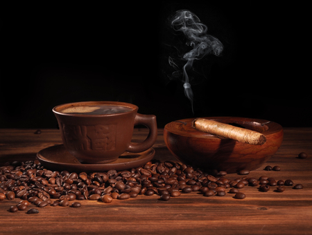 Coffee cup on a wooden backgound. restaurant conceptの写真素材